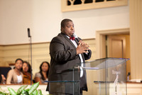 Associate Pastor Austin Humphreys collects offering