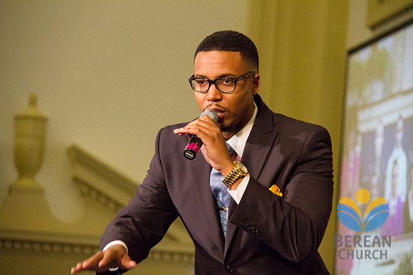 Host mimmicks some of Pastor Russells pulpit mannerisms. (Official Berean SDA Church Photo by Burdie Henri)