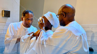 Pastor Long baptizing his niece