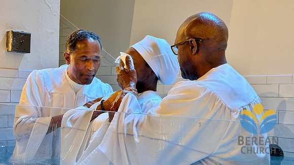 Pastor Long baptizing his niece