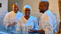 Pastor Long baptizing his niece