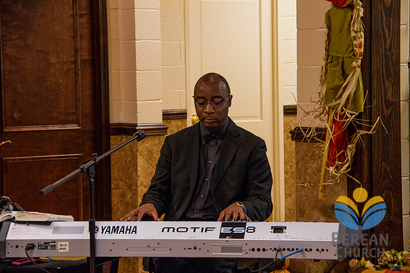 Bruce Seawood, minister of music, takes the keyboard as Gale Jones Murphy teaches the choir a song she composed.  Official Berean Photography (c) 2012 by Burdie Henri