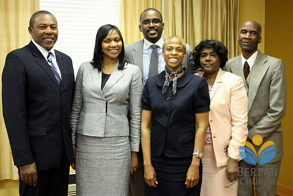 Pastor and Mr. Davis with family members