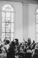 Congregation with hands raised