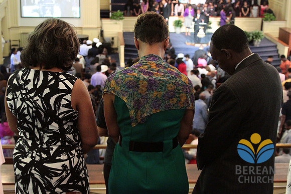 The church at prayer. Members joined hands across the isles. April 28, 2012 (Official Berean SDA Church Photo by David Stewart)