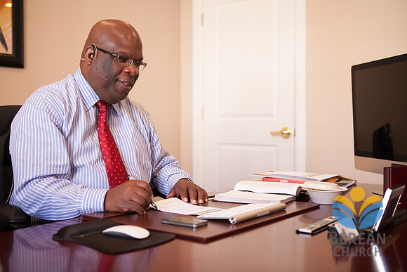 Senior Pastor Fredrick Russell prepares for his message