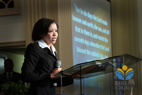 Elder Jennifer Jennifer McCurdy and the congregation recite the fourth commandment. "Remember the Sabbath day to keep it holy...". April 28, 2012 (Official Berean SDA Church Photo by David Stewart)