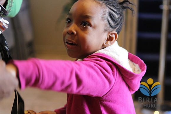 Girl greeting friends. Jan 12, 2013 (Official Berean SDA Church Photo by Richard White)